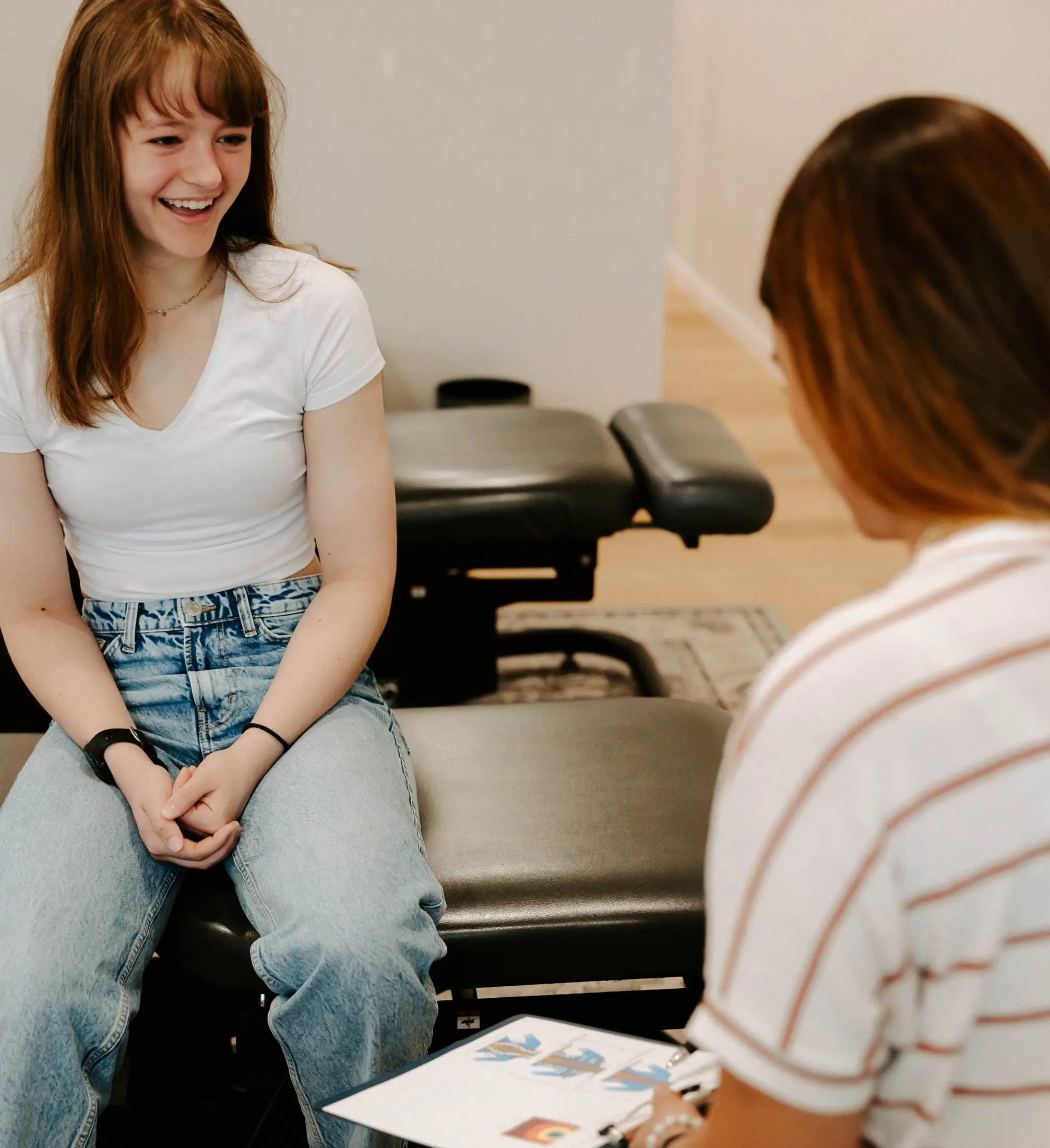 Chiropractor providing family care at Wellhouse Chiropractic