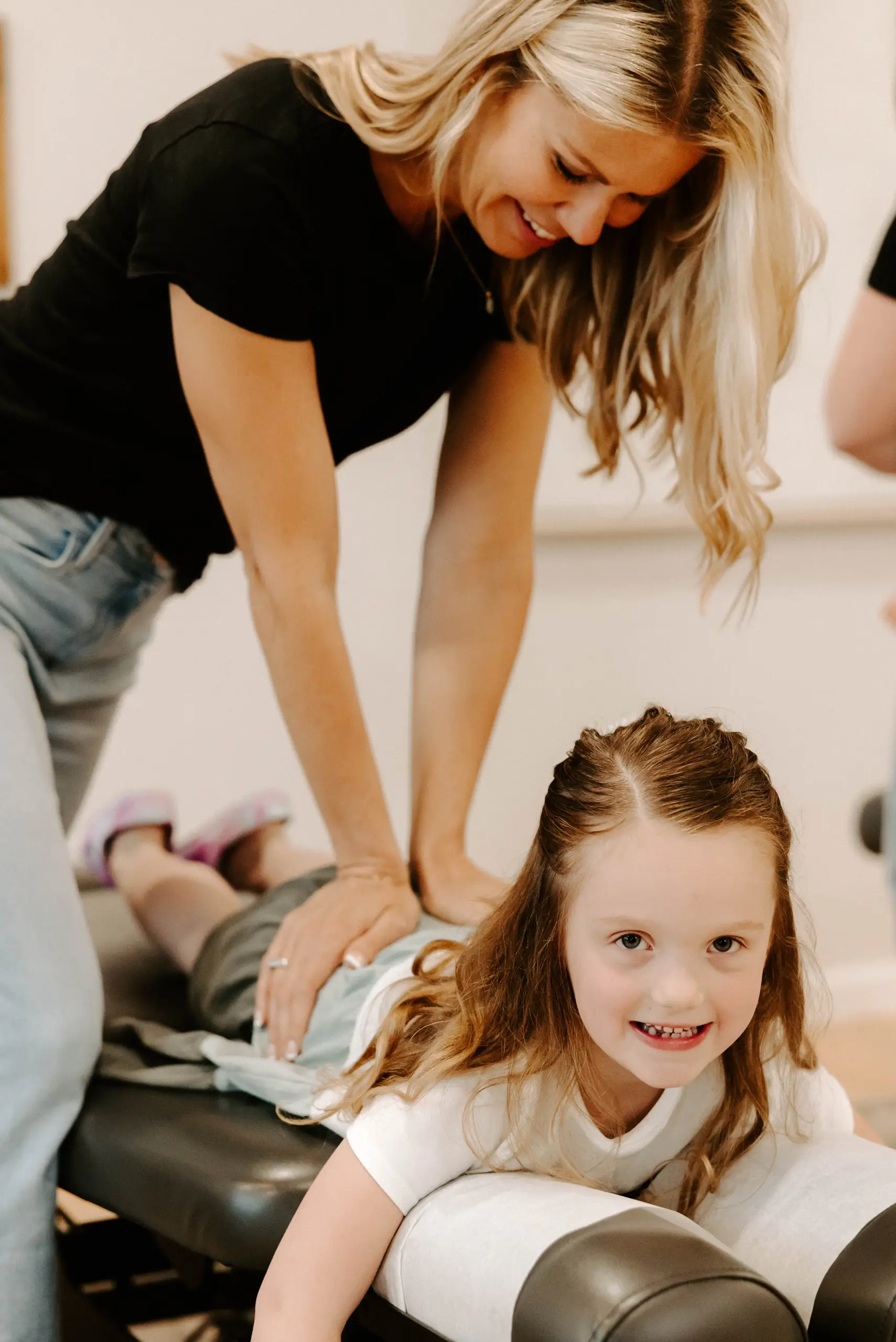 Doctor performing a chiropractic adjustment at Wellhouse Chiropractic in Maple Grove